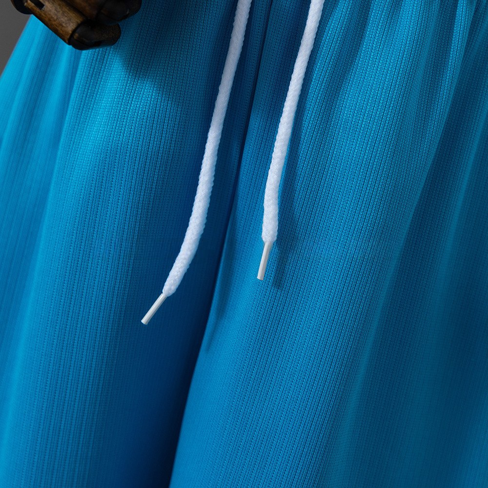 Justerbar snøring i livet på Brasil fotballshorts