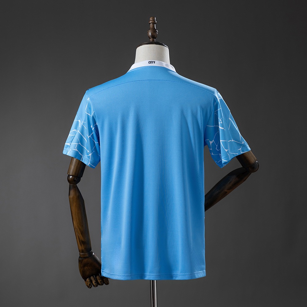 Manchester City 2020/21 lyseblå retro hjemmedrakt med hvitt mosaikkmønster