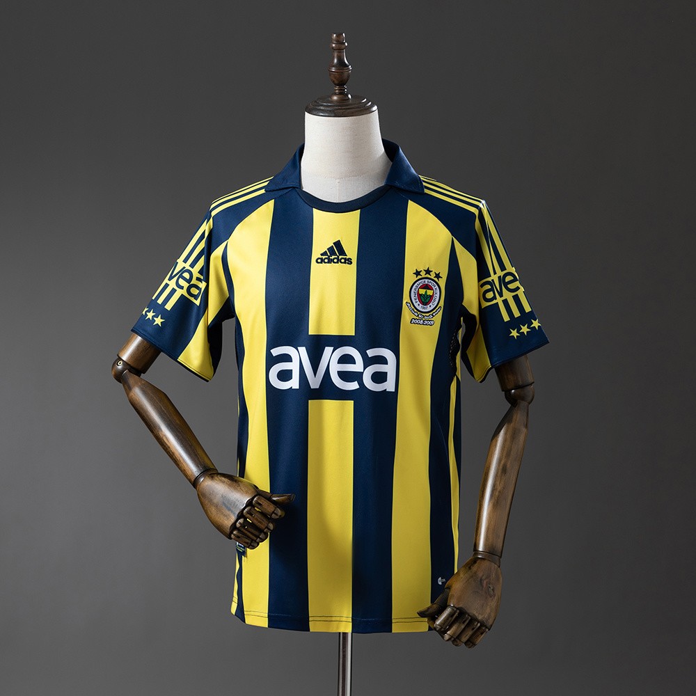 Fenerbahçe retro hjemmedrakt 2008/09 med gule og marineblå striper, sett forfra