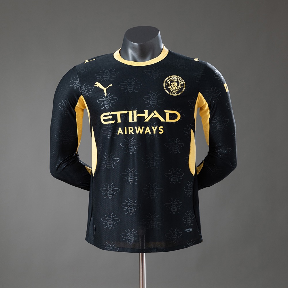 Svart og gull Manchester City bortedrakt 26/27 med lange ermer