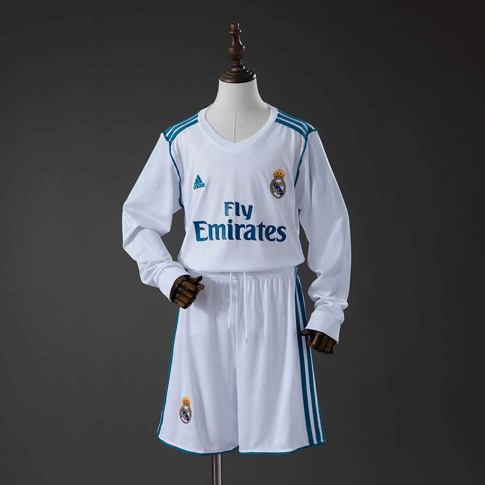Hvit Real Madrid retrodrakt for barn 2017/18 med turkise detaljer og shorts