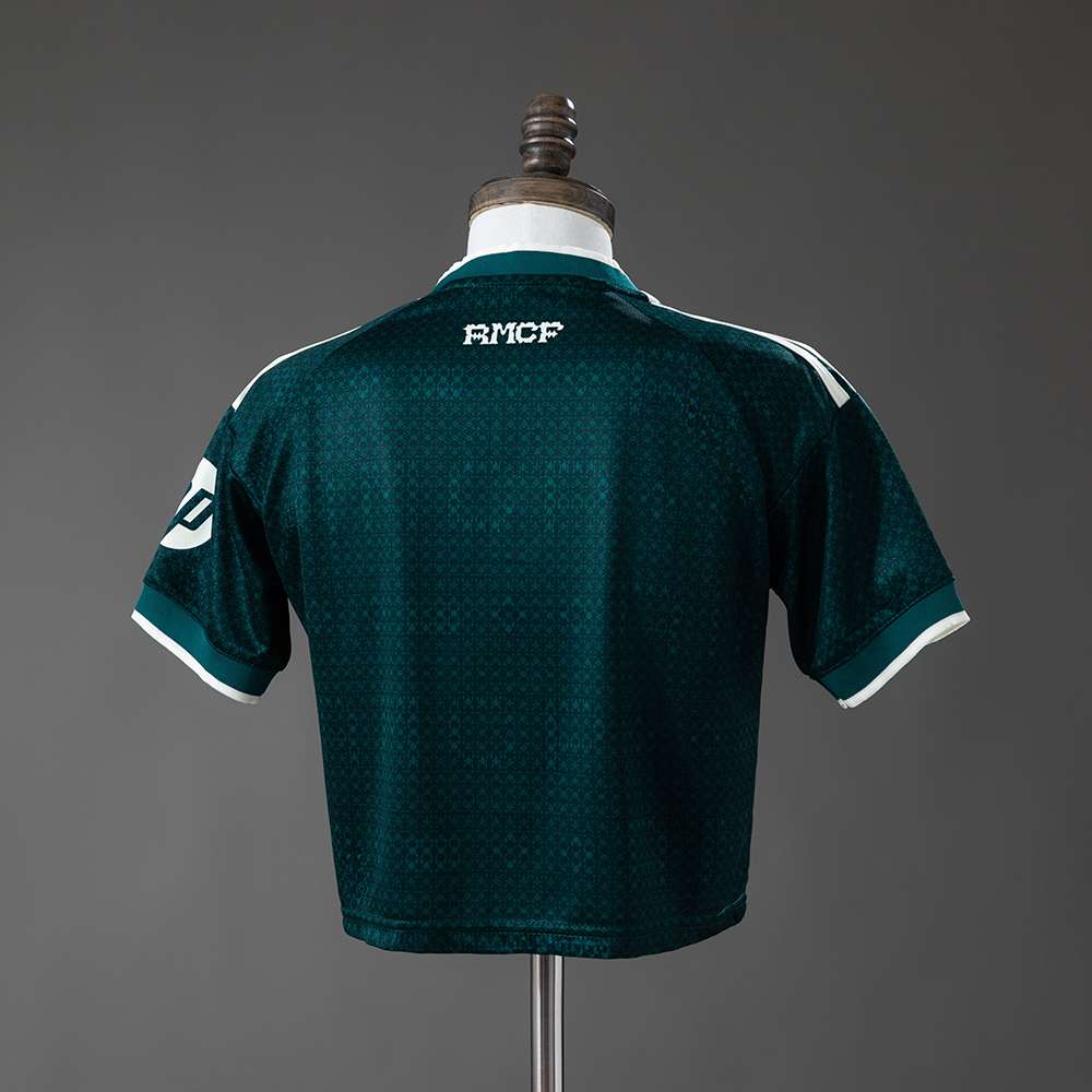 Grønn Real Madrid cropped-drakt for kvinner sett bakfra