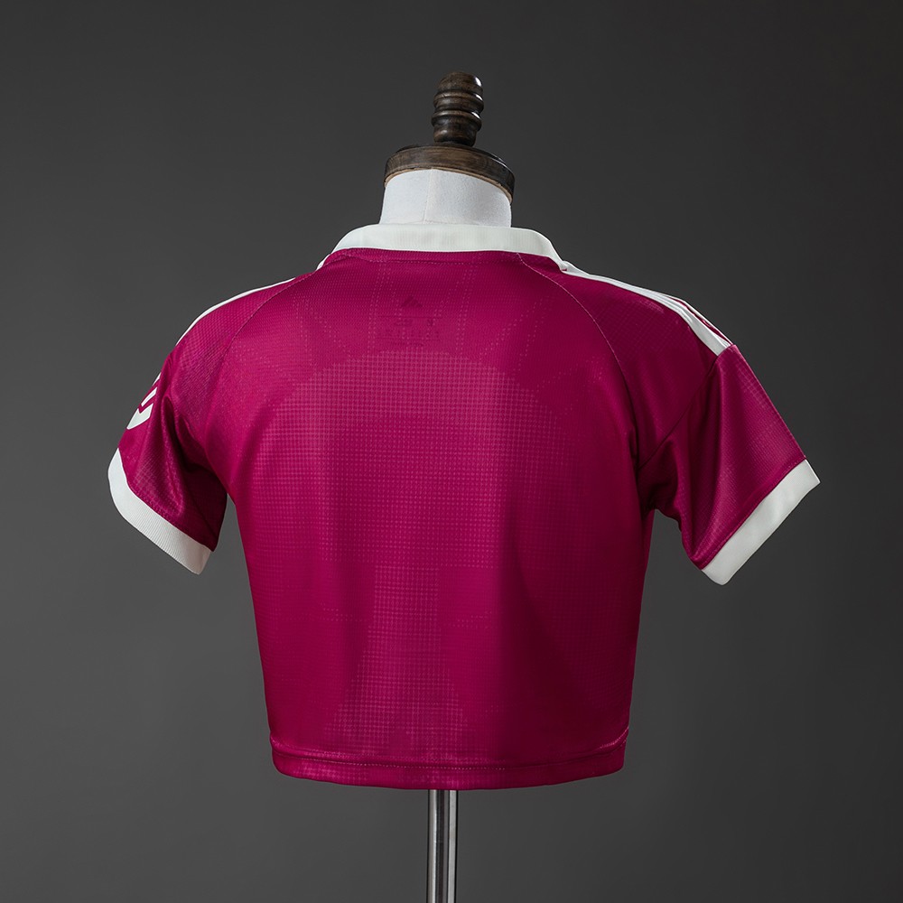 Rosa Real Madrid crop top 2026/27 for kvinner sett bakfra